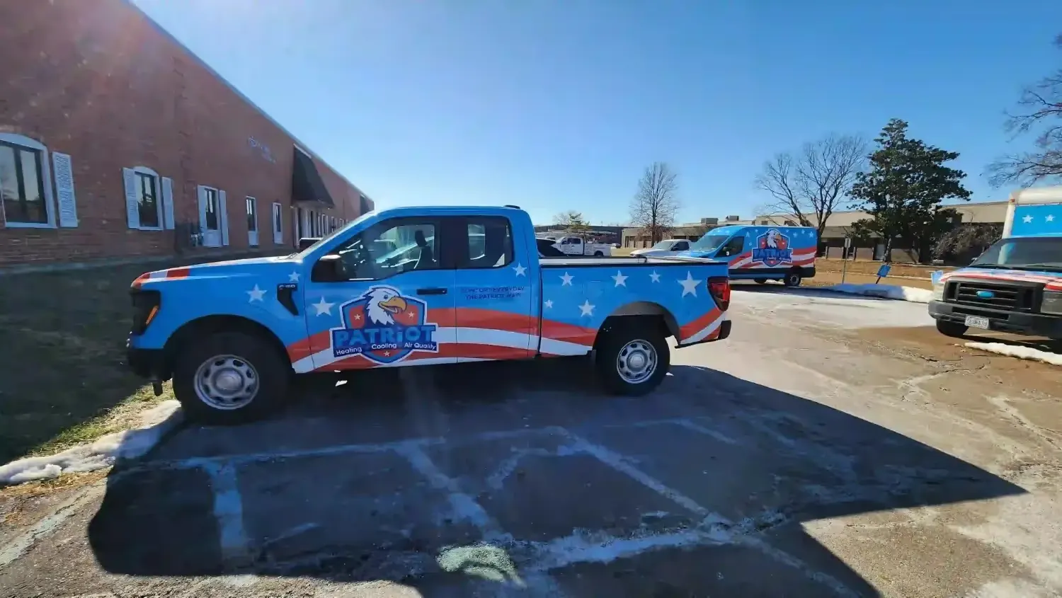 Patriot Heating, Cooling and Air Quality's Van in Parking lot